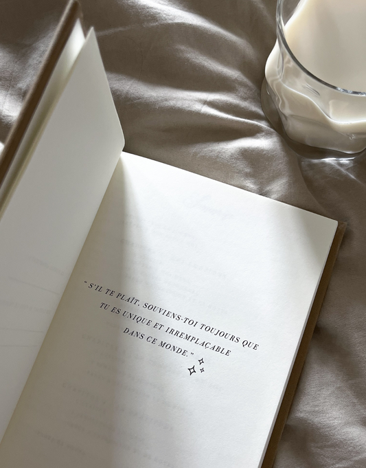 Page du journal enfants Unile avec une citation inspirante et un verre de lait.