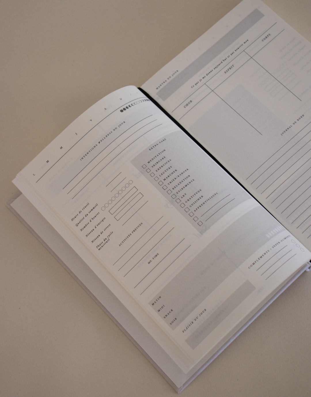 Wellness Book Unile Self-care journaling en français bien-être et santé.